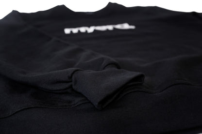 tash.era black crewneck